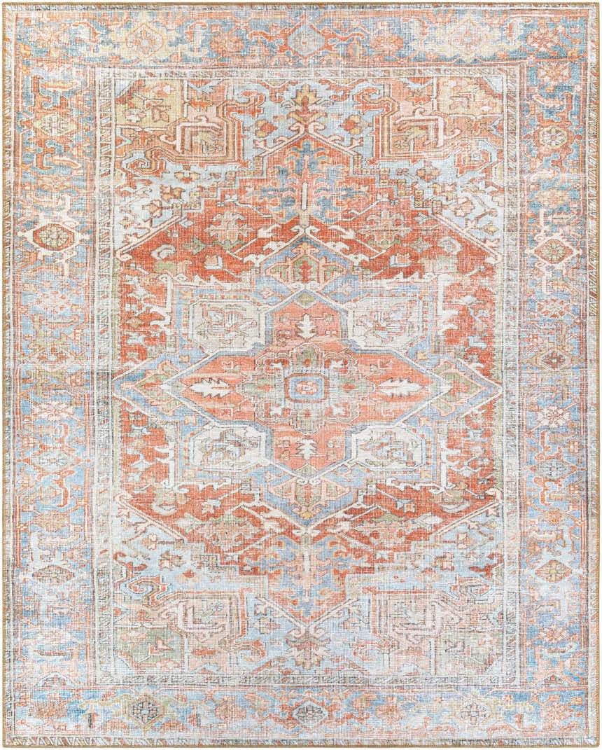 Close-up of the Rust Maayon Washable Rug, featuring a traditional oriental design with brick red, brown, and denim blue tones. Design-Rectangle-7696