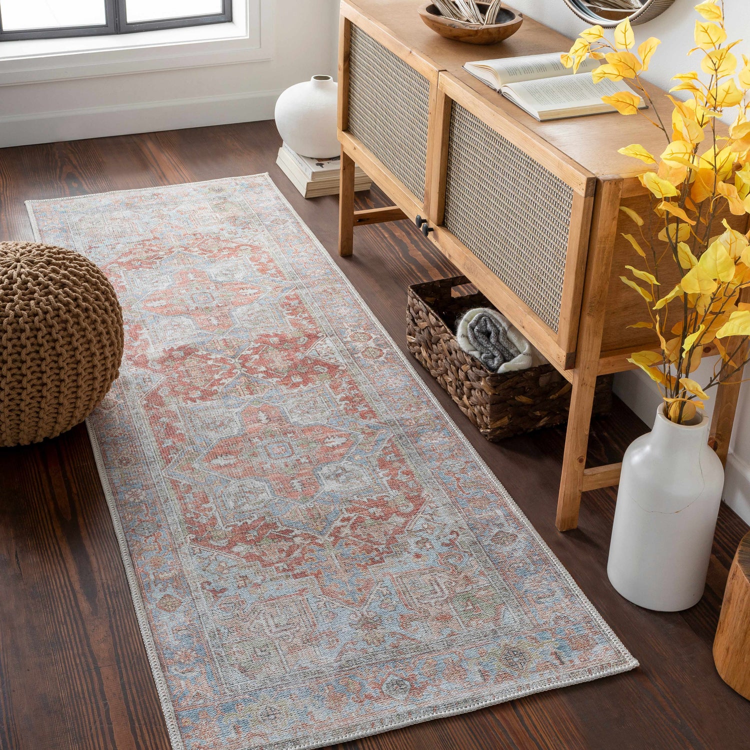 Hallway scene with a Rust Maayon Washable Rug. The rug features brick red, brown, and blue tones in an oriental pattern. Roomscene-Runner