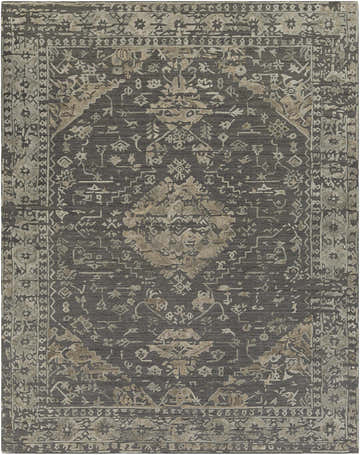 Close-up of the Macgregor Area Rug. Hand-loomed rug in charcoal, light gray, and olive with a traditional, bohemian-inspired pattern. Design-Rectangle-810