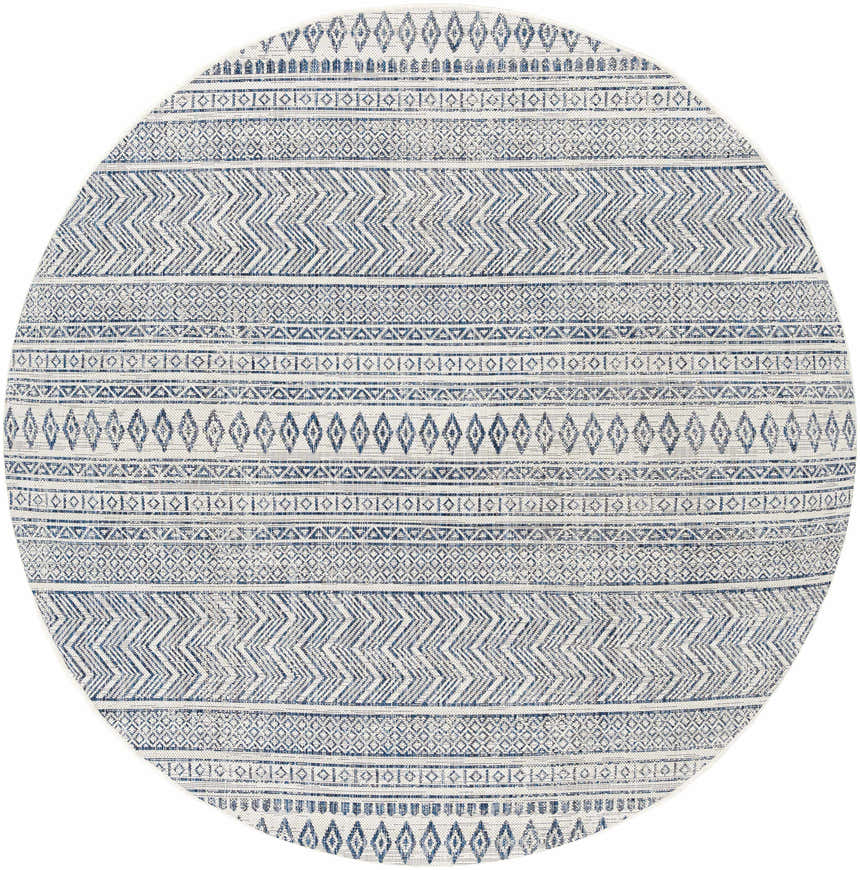 Close-up of a round Madras Light Blue Green All Over Performance Area Rug with bohemian-inspired geometric patterns. Design-Round-67