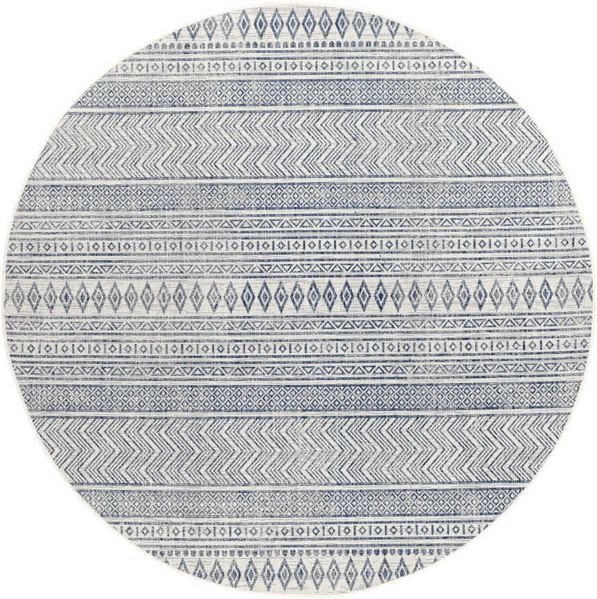 Close-up of the round Madras Light Blue Green rug, showcasing its bohemian-inspired diamond and chevron pattern. Design-Round-710