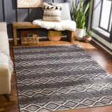Living room scene with Maluanluan Jute Carpet in black and light beige. Bohemian rug with diamond pattern. Farmhouse style. Roomscene-Rectangle