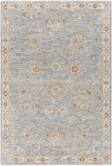 Close-up of the Mangham Thick Luxe Area Rug in blue, brick red, and beige. Traditional oriental rug design with a soft, luxe texture. Design-Rectangle-575