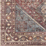 Close up of the traditional Maplesville Washable Area Rug featuring beige, teal, and rust floral patterns. Swatch