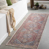 Hallway scene with a beige and teal Maplesville Washable Area Rug runner featuring a traditional diamond pattern. Roomscene-Runner