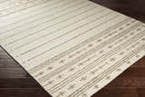 Close-up of the ivory Matawan Premium Wool Rug with a brown striped and floral pattern on dark wood flooring. Corner