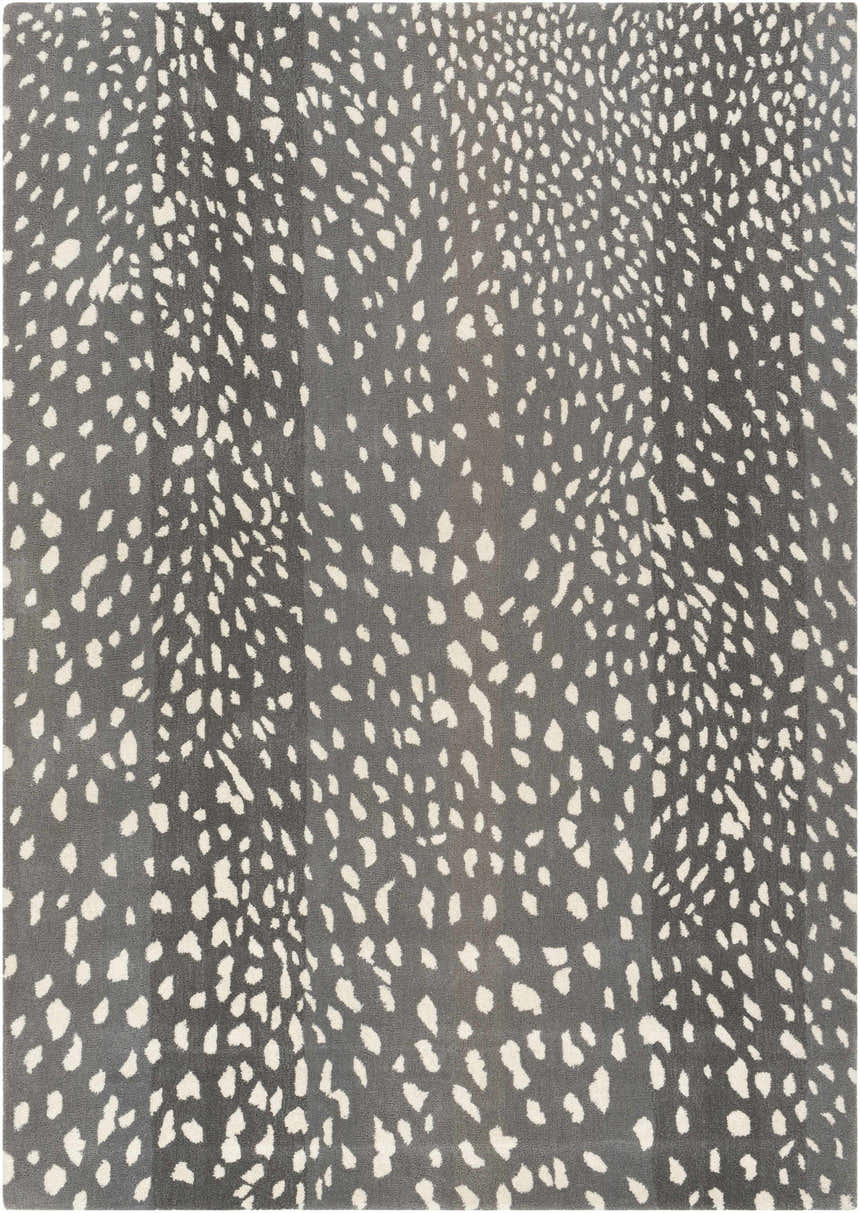 Close-up of the Athena Gray Giraffe Print Wool Rug. Cream spots on a gray, hand-tufted wool rug. Animal print rug. Design-Rectangle-58
