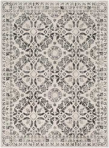 Close-up of the Megargel Area Rug featuring a floral, charcoal, gray, and light beige transitional pattern. Design-Rectangle