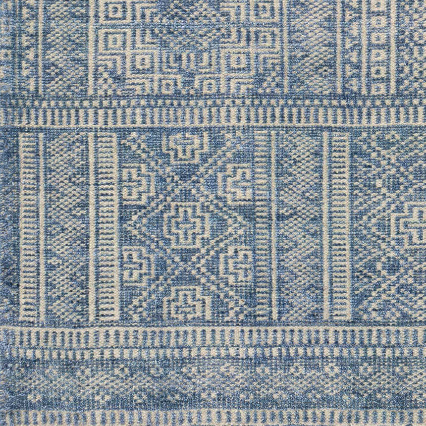Close-up of the Meigs Blue Premium Viscose & Wool Rug showing its geometric, bohemian-inspired pattern and soft texture. Swatch