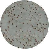 Close-up of the round Sage Elsu Area Rug, featuring a sage background with brown and taupe floral branch pattern. Design-Round-6