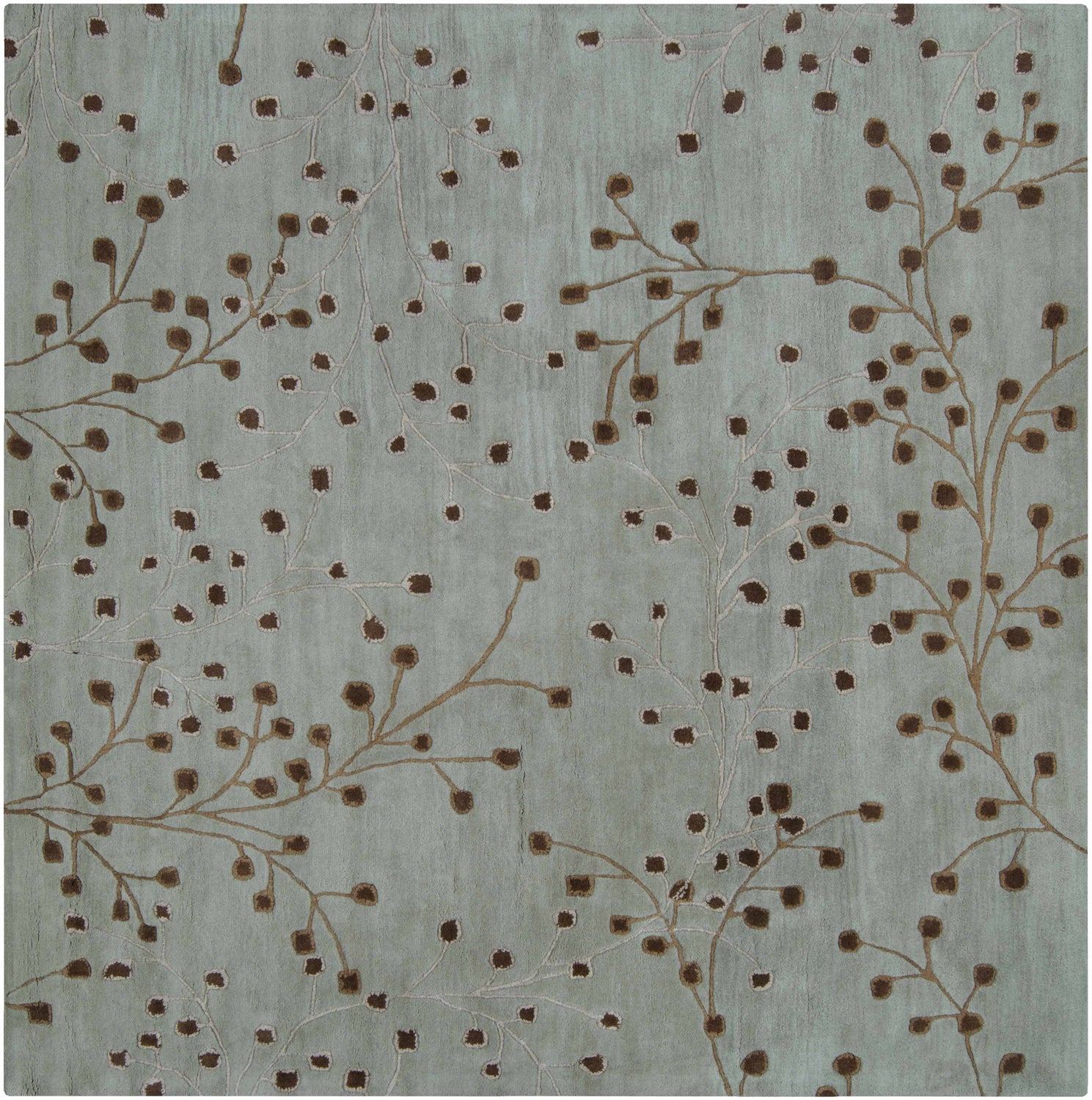 Close-up of the Sage Elsu Area Rug. Sage green wool rug with a dark brown and taupe floral branch pattern. Design-Square-8