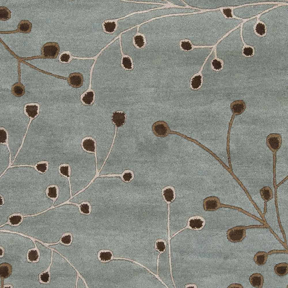 Close-up of the Sage Elsu Area Rug. Sage background with brown floral branch pattern. Hand-tufted wool texture. Swatch