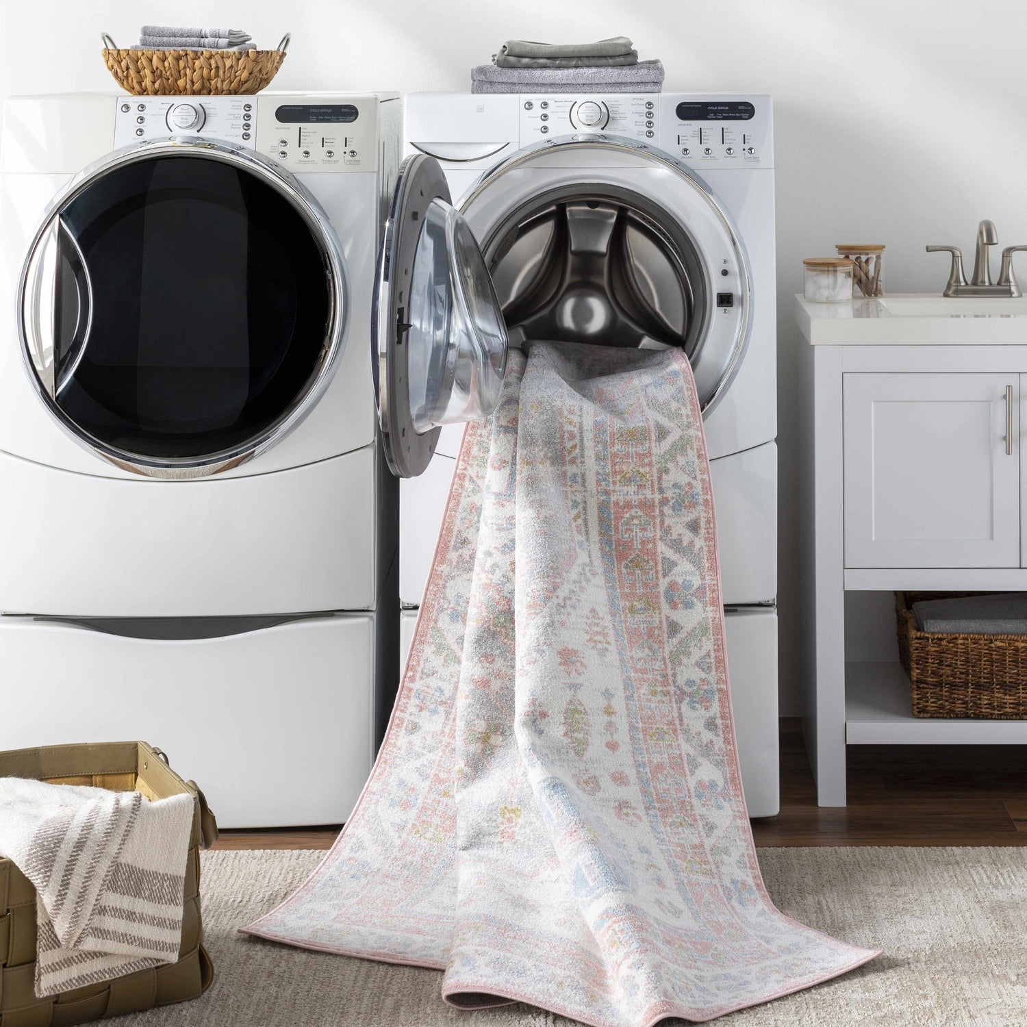 Maha Washable Area Rug in a laundry room being washed. The rug is bone, faded driftwood, mocha, and steel. Washing-Machine