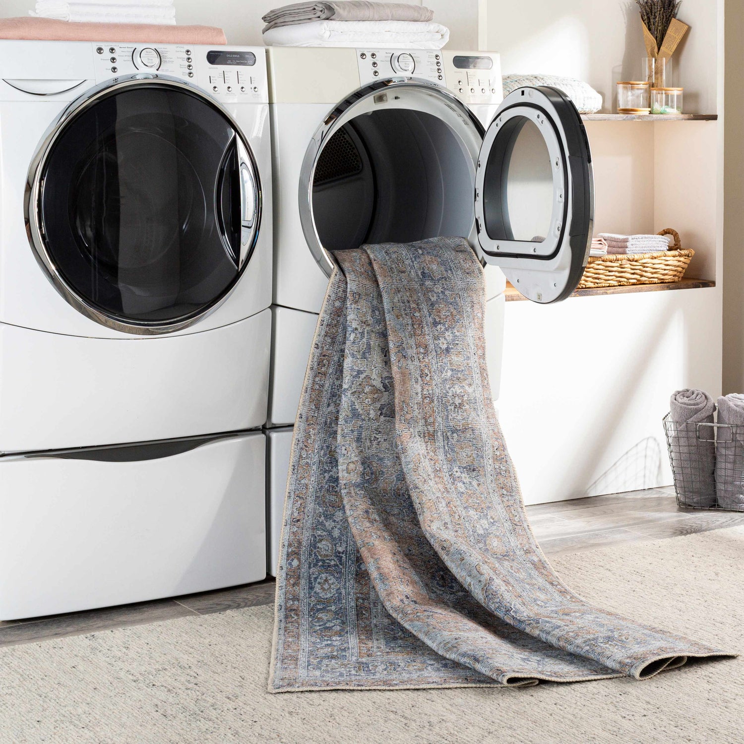 Mianay Washable Area Rug in laundry room being washed. Blue, beige oriental rug in dryer. Easy clean rugs. Washing-Machine