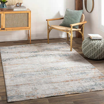 Living room scene with a Midhurst Luxe Rug in brick red, cream, dusty sage, and gray colors. Modern decor with wood accents and a teal pillow. Roomscene-Rectangle