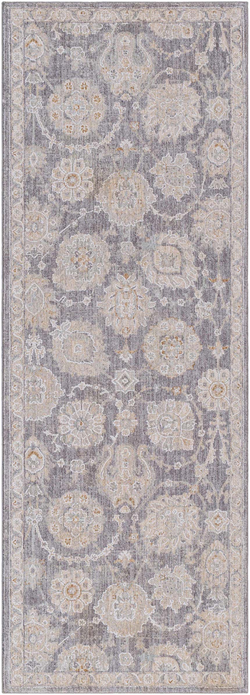Close-up of the Mimarsinan Thick Luxe Statement Rug. Features a traditional floral pattern in gray, beige, and brown tones. Design-Runner-2773