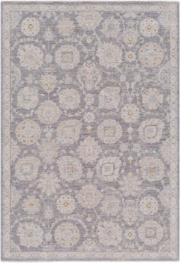 Close-up of the Mimarsinan Thick Luxe Statement Rug. Features a traditional floral pattern in brown, gray, beige and dusty sage tones. Design-Rectangle-575