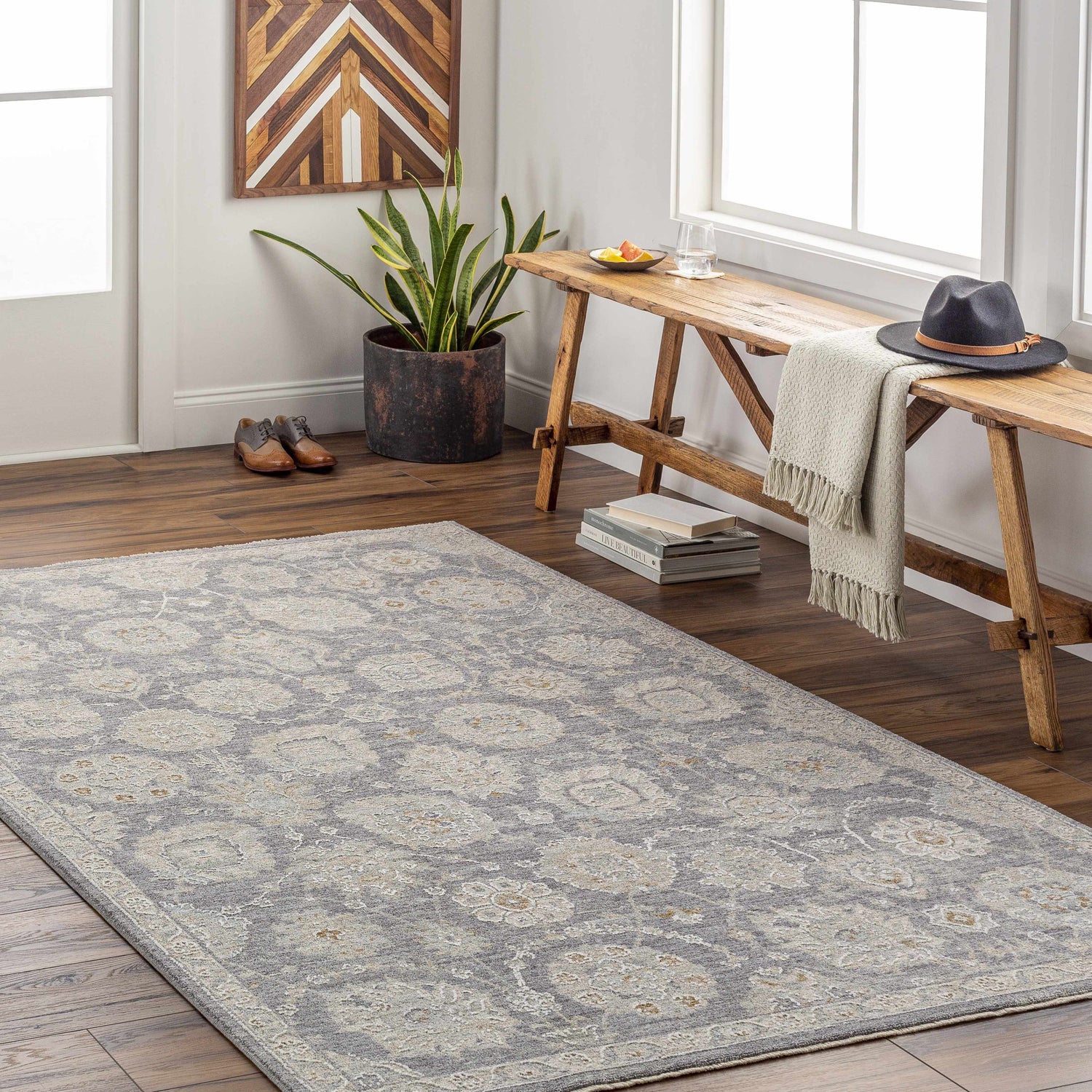 Entryway with a gray Mimarsinan Thick Luxe Statement Rug, wooden bench, and decor. Farmhouse style. Roomscene-Rectangle