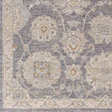 Close-up of Mimarsinan rug, showing gray, beige, and brown floral pattern and traditional oriental design. Swatch