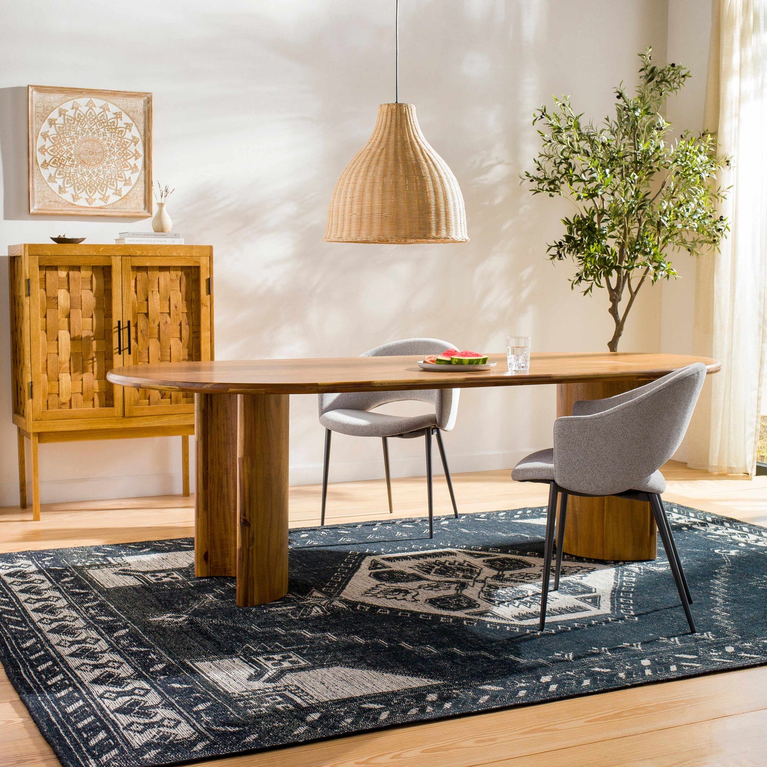 Dining room with wood table, gray chairs, and black and cream Minapan Premium Area Rug. Roomscene-Rectangle