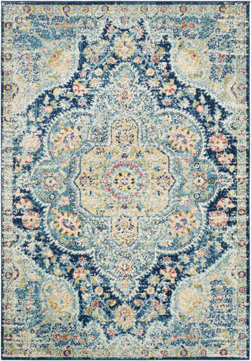 Close-up of the Mallacoota Area Rug. Features cream, dark pink, light slate, navy, rose, sky blue, and yellow colors. Design-Rectangle-5376