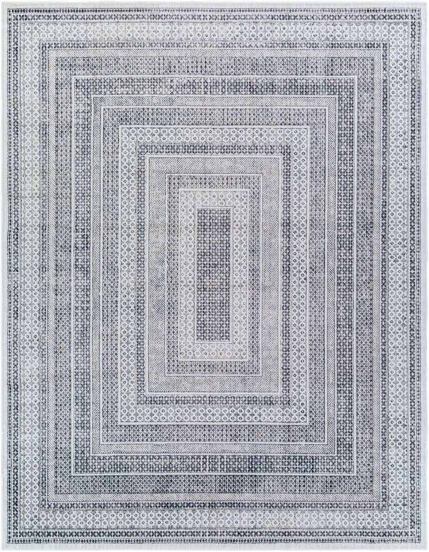 Close-up of the Mandaon Area Rug. Charcoal, cream, and gray geometric pattern with a traditional, bohemian style. Design-Rectangle-71010
