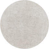 Close-up of round Monto Luxe Rug in cream, gray, and taupe. Bohemian style rug with subtle oriental pattern and soft texture. Design-Round-53