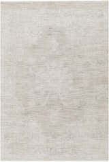 Close-up of the Monto Luxe Rug, a machine-woven rug in cream, taupe, and gray with a subtle, traditional pattern. Design-Rectangle-575