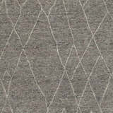 Close-up of the textured Molugan Gray Premium Wool Rug with a cream diamond pattern. Hand-knotted wool and viscose blend. Swatch