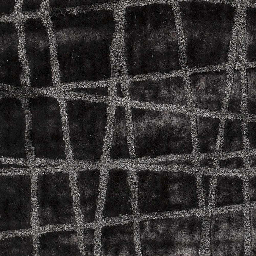 Close-up of the Monango Carpet. Charcoal rug with a medium gray, hand-woven, contemporary grid pattern. Swatch