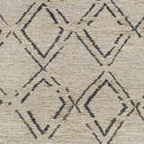 Close-up of Monkstown Jute Carpet featuring a hand-woven texture and a black geometric diamond pattern on a taupe background. Swatch