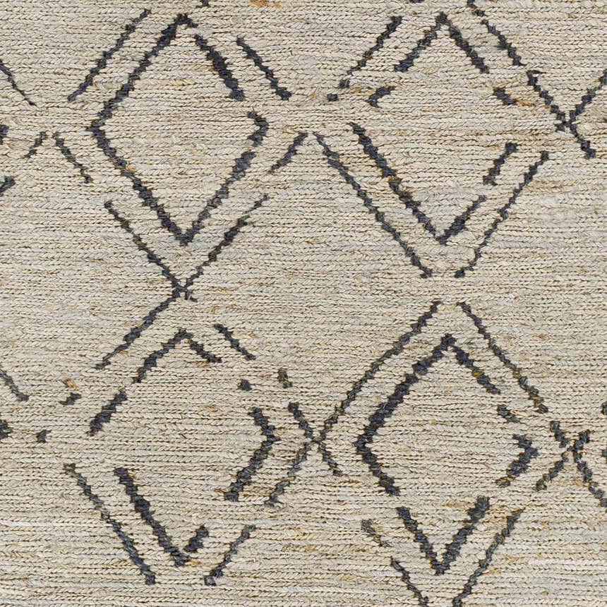 Close-up of Monkstown Jute Carpet featuring a hand-woven texture and a black geometric diamond pattern on a taupe background. Swatch