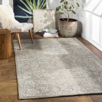 Light-filled room featuring the Montmorenci Wool & Faux Silk Rug in charcoal, ivory, mustard, and seafoam. Roomscene-Rectangle