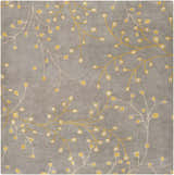 Close-up of Elsu Mustard Wool Area Rug. Charcoal rug with a mustard and taupe floral branch pattern. Hand-tufted texture. Design-Square-6