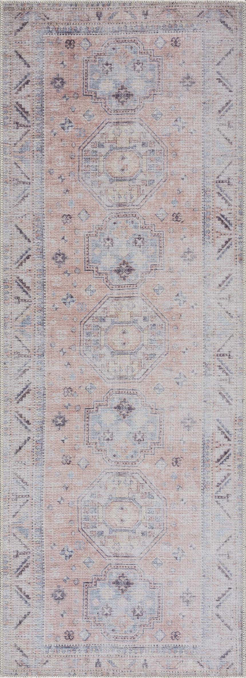Close-up of the Morcott Peach Washable Area Rug, featuring a traditional oriental design in peach, ivory, and pale blue tones. Design-Runner