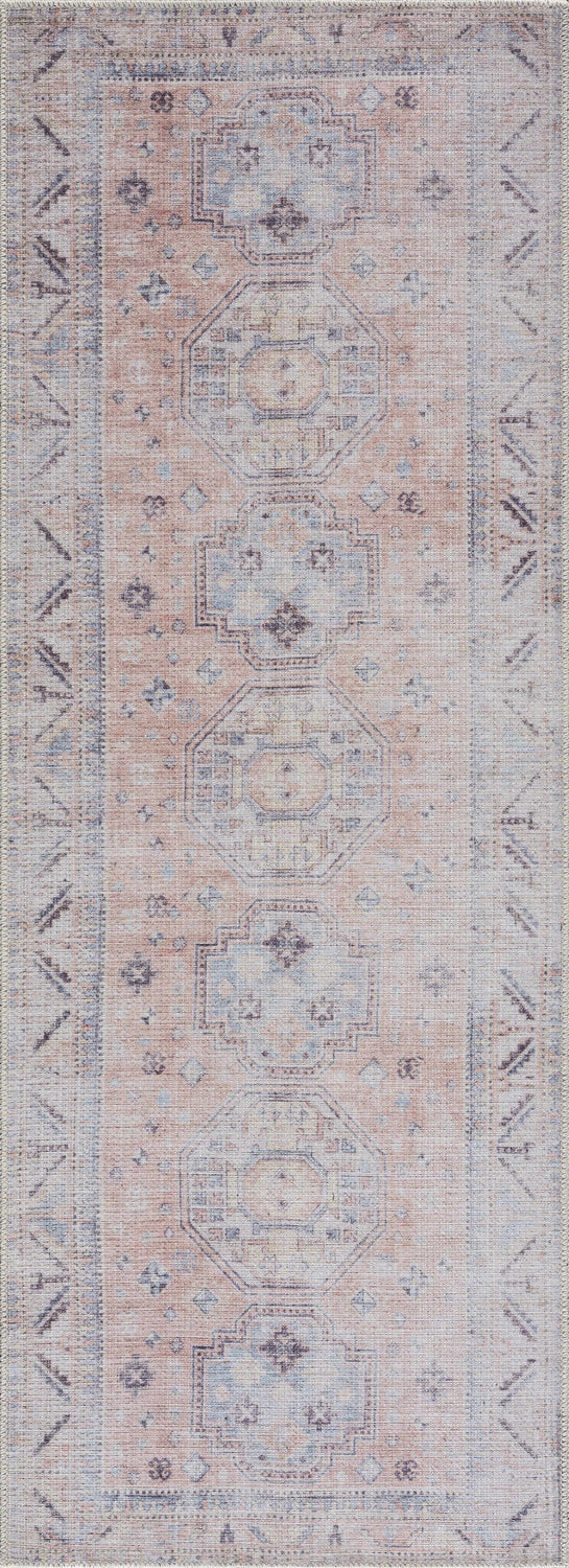 Close-up of the Morcott Peach Washable Area Rug, featuring a traditional oriental design in peach, ivory, and pale blue tones. Design-Runner