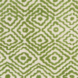 Close-up of the Morehead Area Rug. Grass green geometric diamond pattern on light beige wool. Hand-knotted texture. Swatch