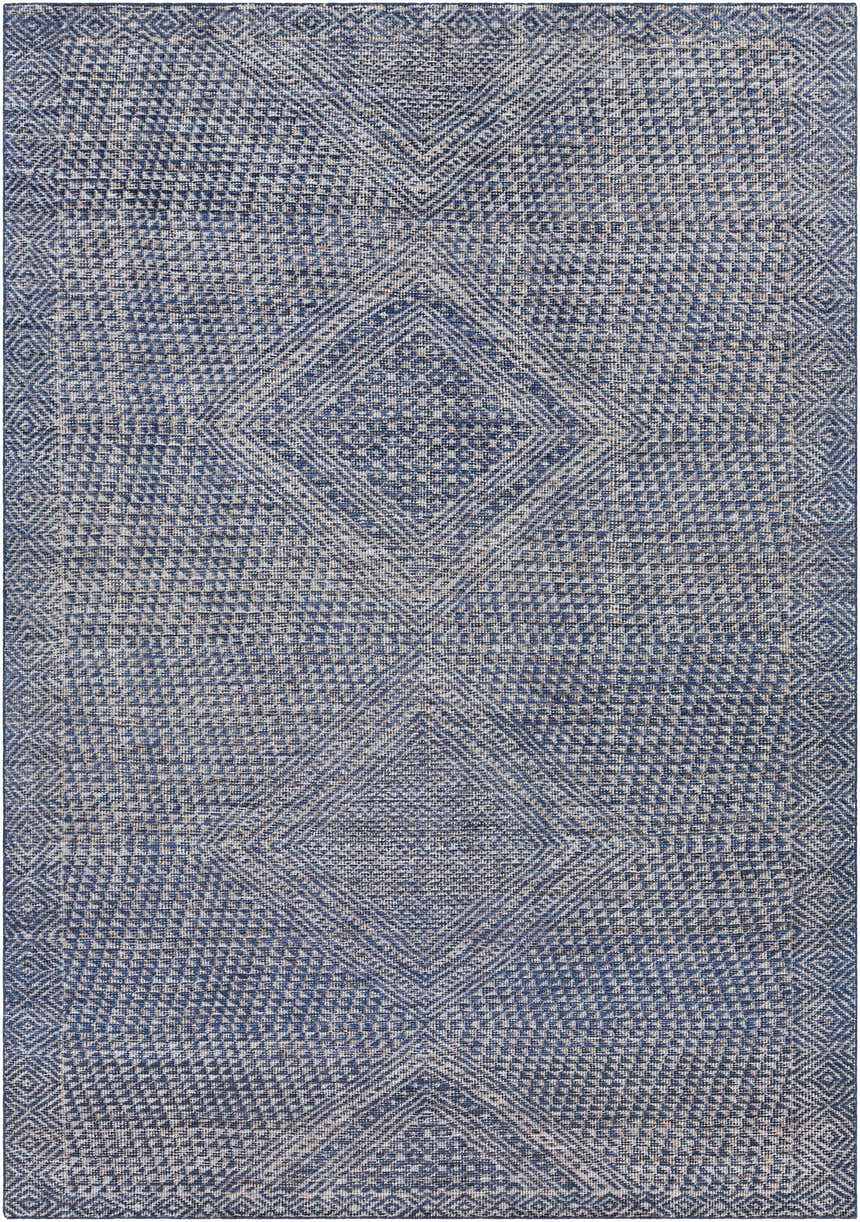 Close-up of the Moyne Area Rug. Hand-knotted rug with a geometric diamond pattern in navy, dark blue, charcoal, and white. Design-Rectangle-811