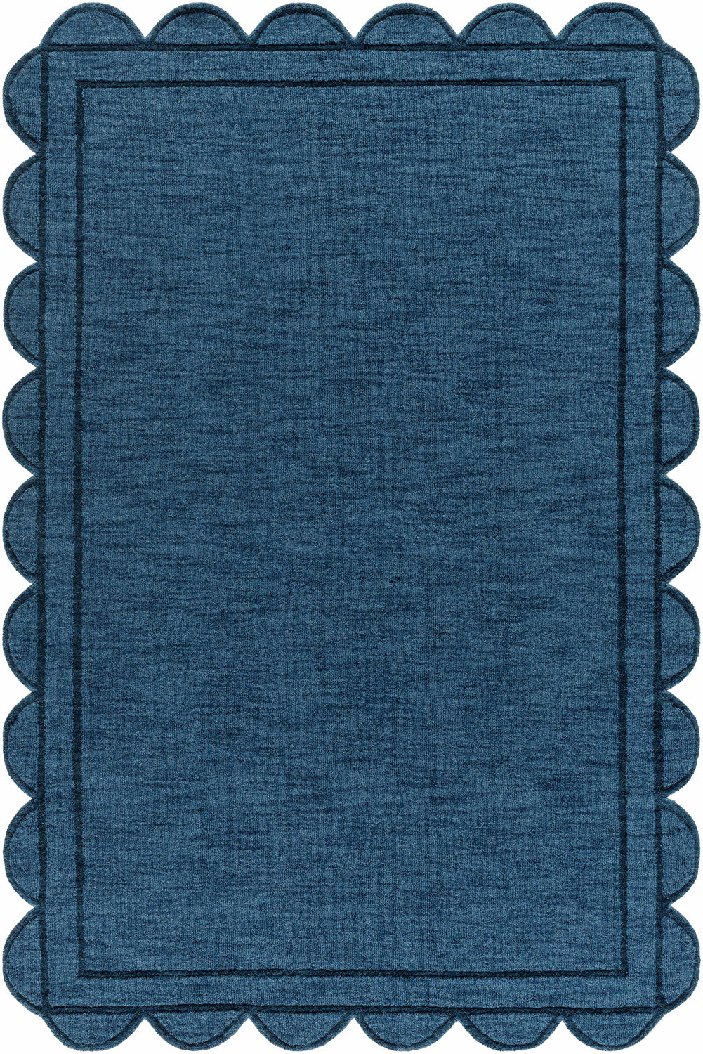 Close-up of the hand-loomed Uhuro Blue Geometric Area Rug, featuring a unique scalloped edge and textured wool. Design-Rectangle-576