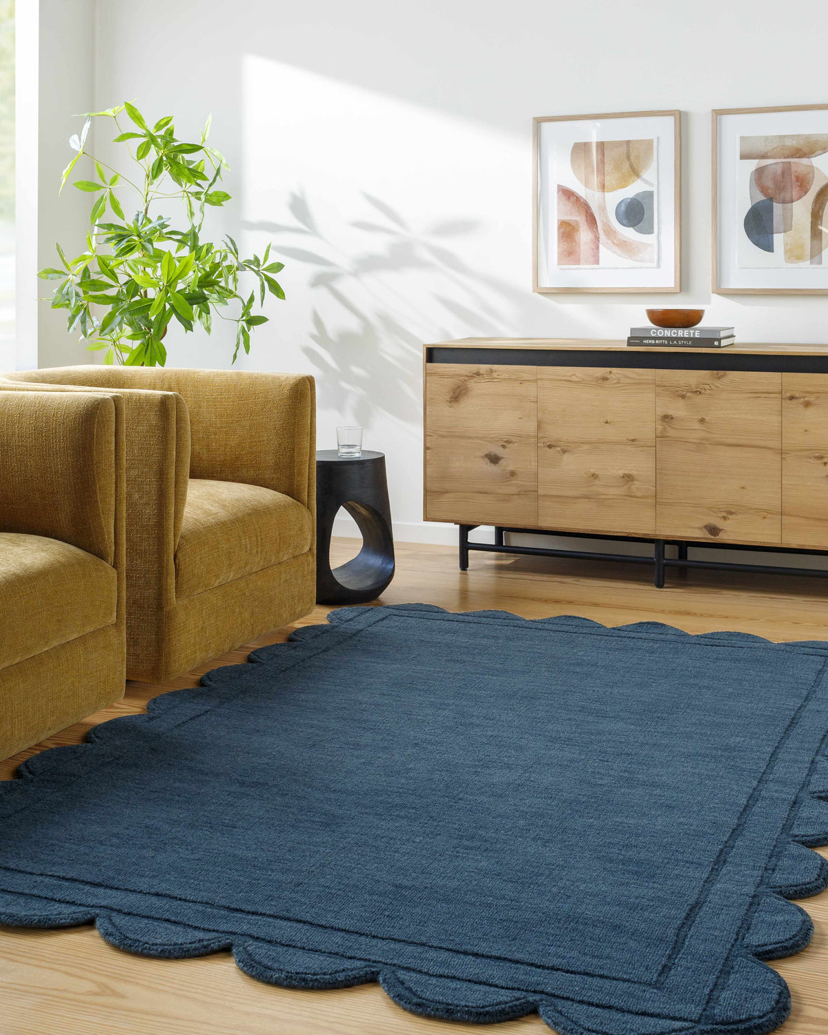 Living room scene with the Uhuro Blue Geometric Area Rug, mustard chairs, and wood cabinet. Roomscene-Rectangle