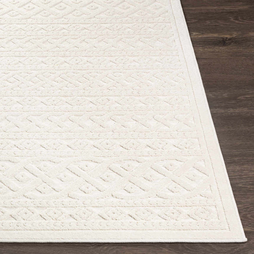 Close-up of the cream Maribyrnong 3D Outdoor Area Rug showing its geometric, raised pattern and soft texture. Front