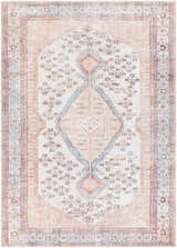 Close-up of the Moora Washable Area Rug. Bohemian style rug with floral and diamond pattern in aqua, brown, and blush tones. Design-Rectangle-5373