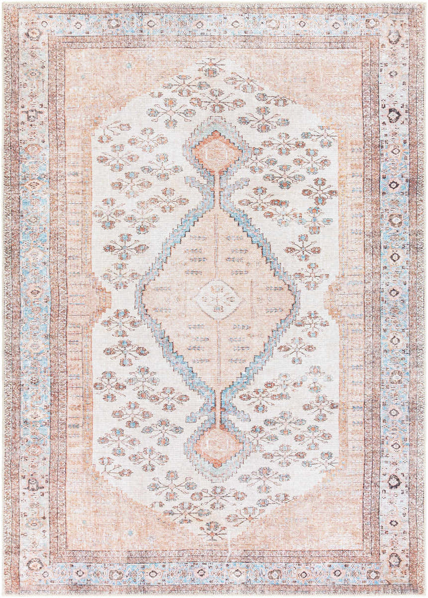 Close-up of the Moora Washable Area Rug. Bohemian style rug with floral and diamond pattern in aqua, brown, and blush tones. Design-Rectangle-5373