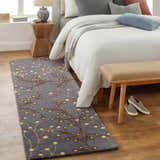 Bedroom scene with Elsu Brown Beige Wool Rug runner featuring a floral design in brown, beige, and green. Roomscene-Runner