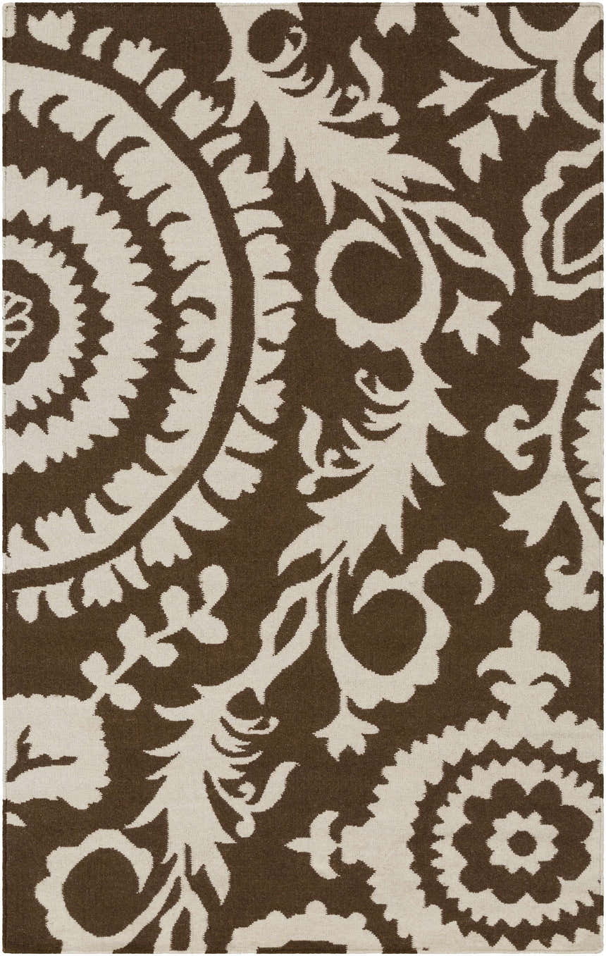 Close-up of the hand woven Naeva Area Rug. Dark brown wool rug with a cream-colored, contemporary floral and medallion pattern. Design-Rectangle-58