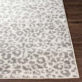 Close-up of the Nagambie Leopard Print Area Rug showing its gray animal pattern and soft, textured pile. Front