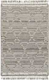 Close-up of the hand-knotted Nairobi Area Rug. Black, gray, and ivory wool rug with striped and diamond patterns and fringe. Design-Rectangle-576
