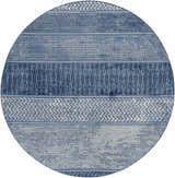 Close-up of the round Nampa Area Rug. Denim, ivory, and navy geometric patterns create a contemporary farmhouse design. Design-Round-710