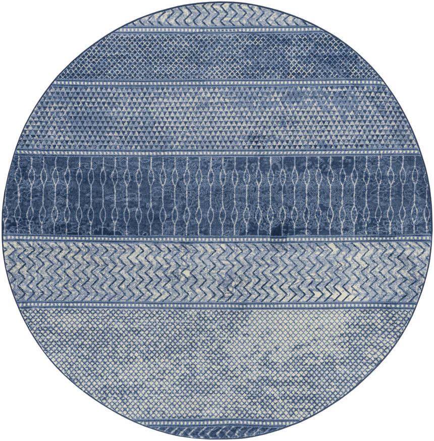 Close-up of the round Nampa Area Rug. Denim, ivory, and navy geometric patterns create a contemporary farmhouse design. Design-Round-710