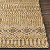 Close-up of the tan and black geometric pattern on the hand woven Nasugbu Jute Carpet. Front